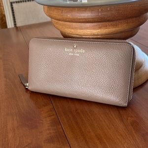 Authentic Kate Spade Taupe Three-Section Wallet.